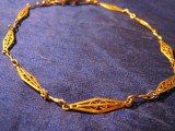 Chaine de montre ancienne en métal doré
