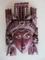Masque décoratif sculpté Asie